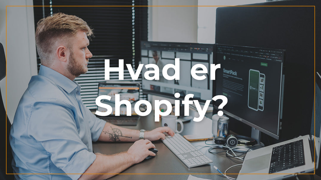 Lasse sidder ved computer og fortæller hvad Shopify er.
